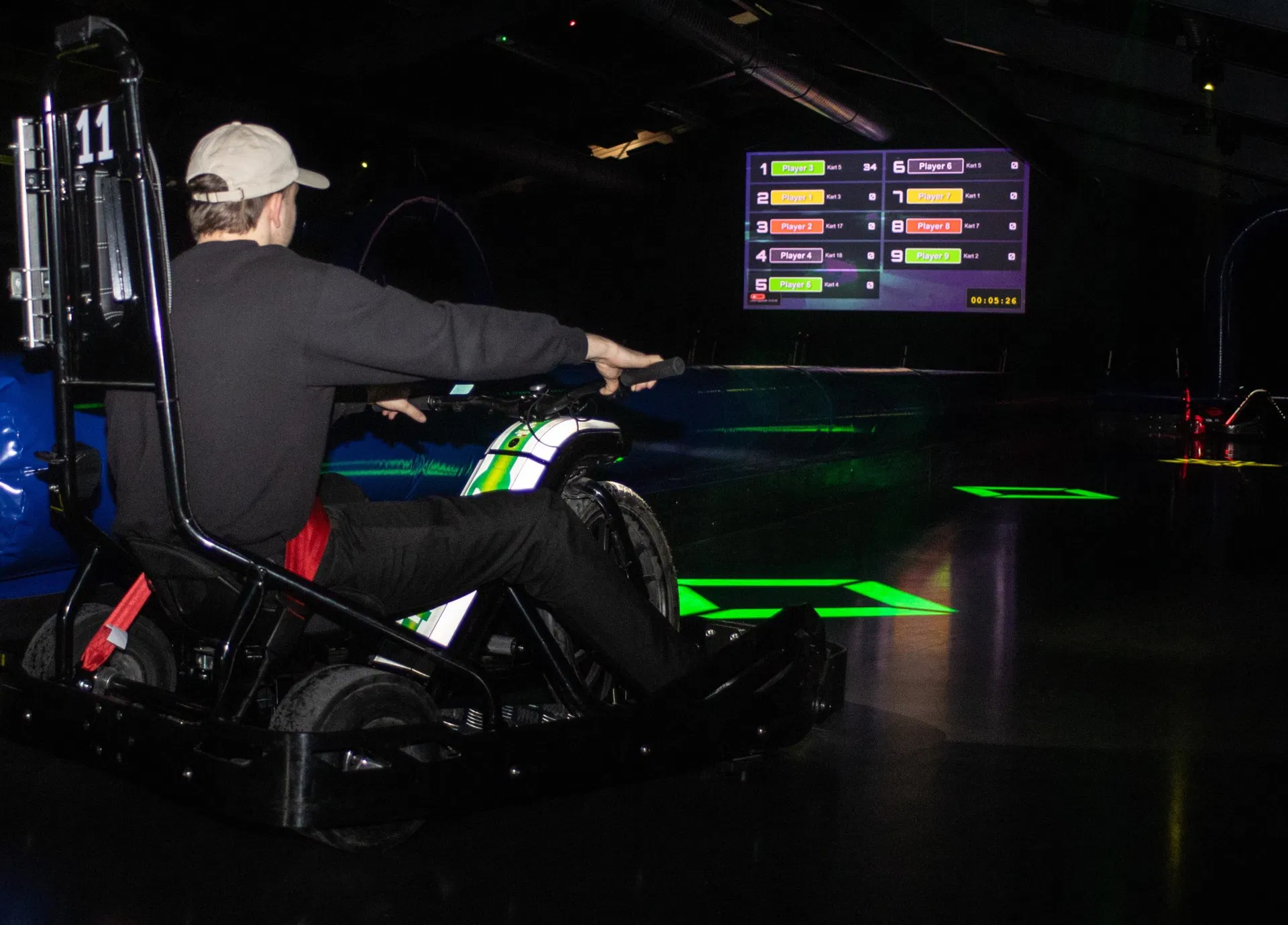 Immersive go-kart experience with projected leaderboard